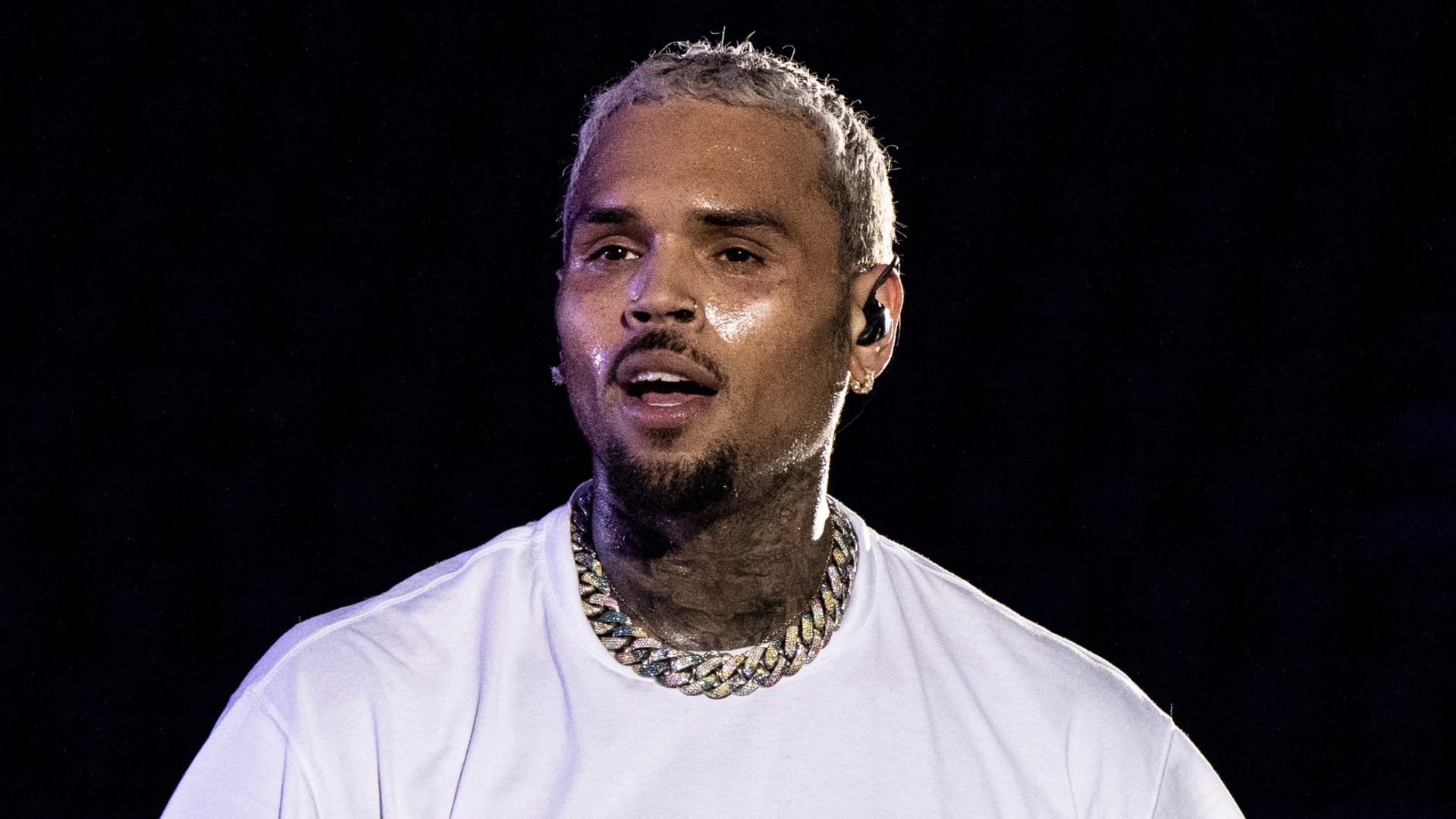 Chris Brown Throws Jacket Into Crowd & Fans Tussle (Videos)